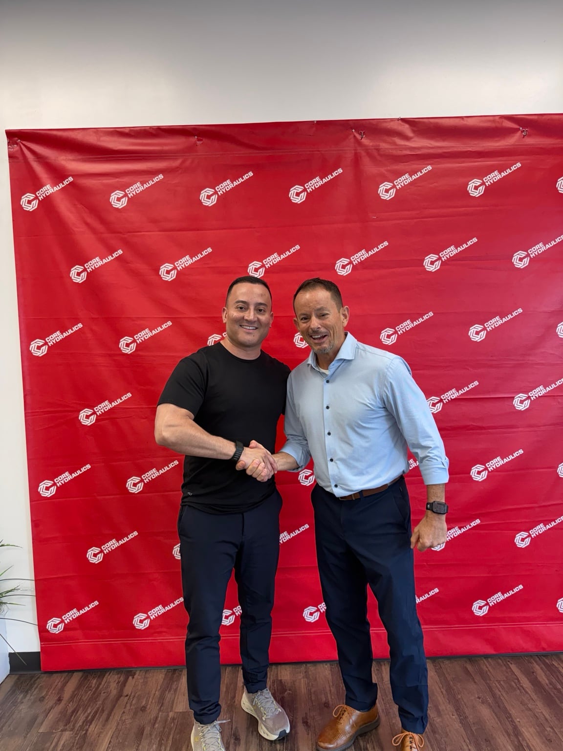 Ben Pacheco with Dan of Fleet Glass Services at Core Hydraulics